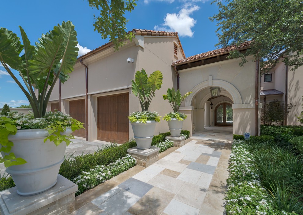 This is an example of a mediterranean house exterior in Dallas.
