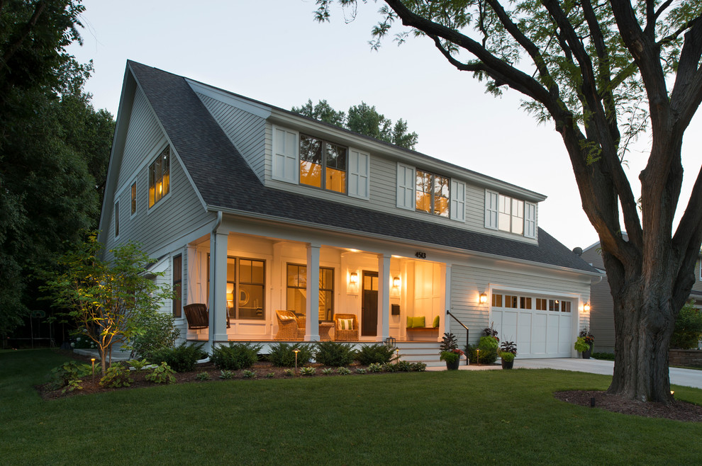 Example of a beach style gray exterior home design in Minneapolis