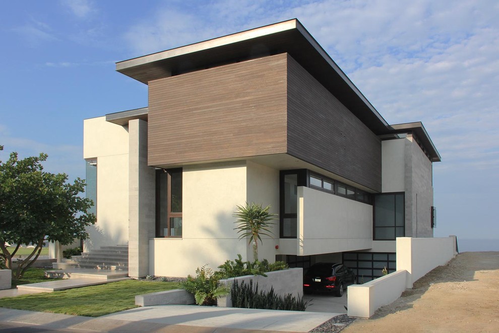Example of a minimalist wood exterior home design in Orange County