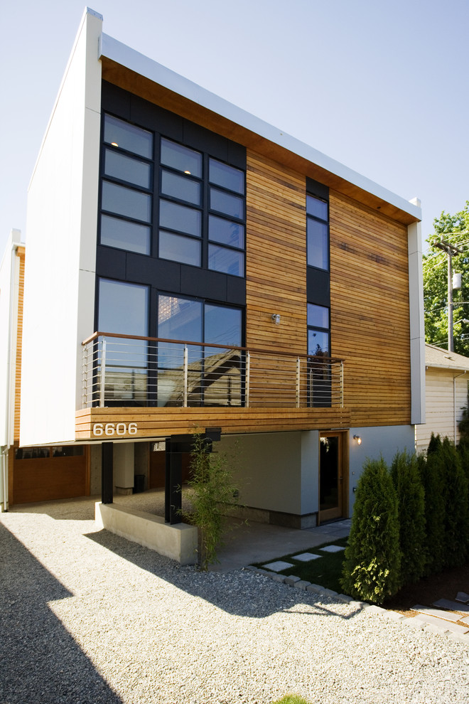 Minimalist wood exterior home photo in Seattle