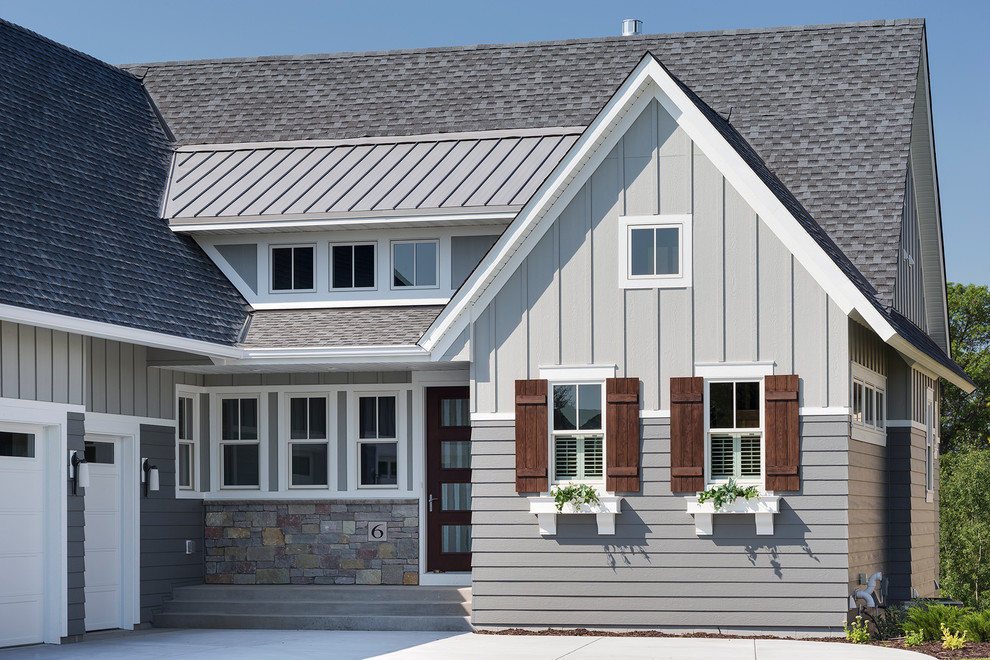 Mid-sized contemporary gray one-story mixed siding gable roof idea in Minneapolis