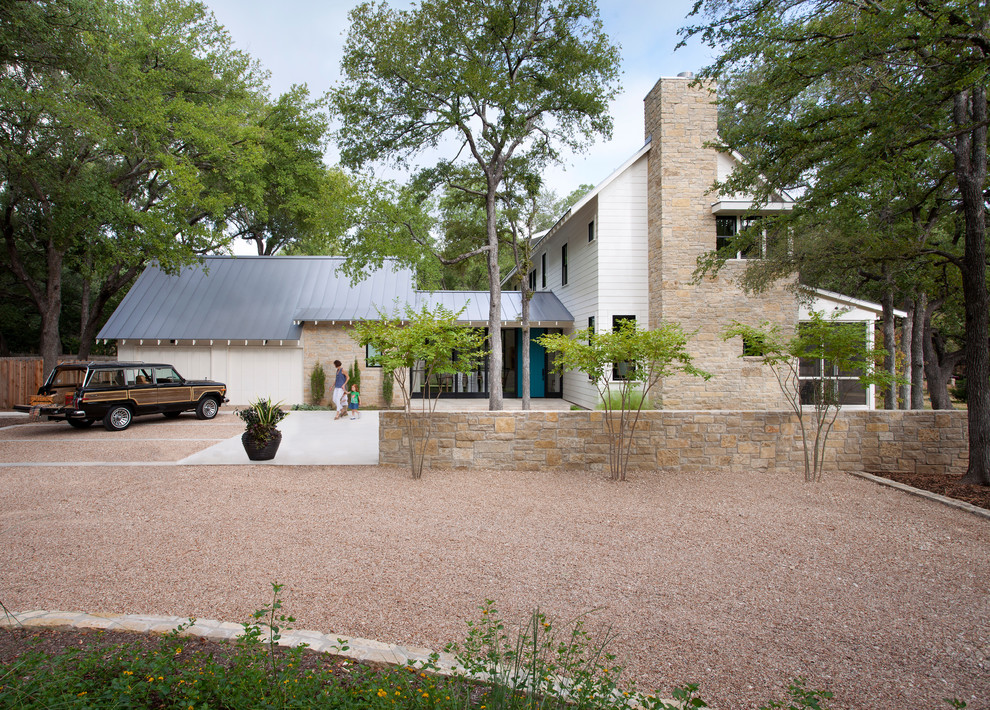 Country two-story mixed siding exterior home idea in Austin