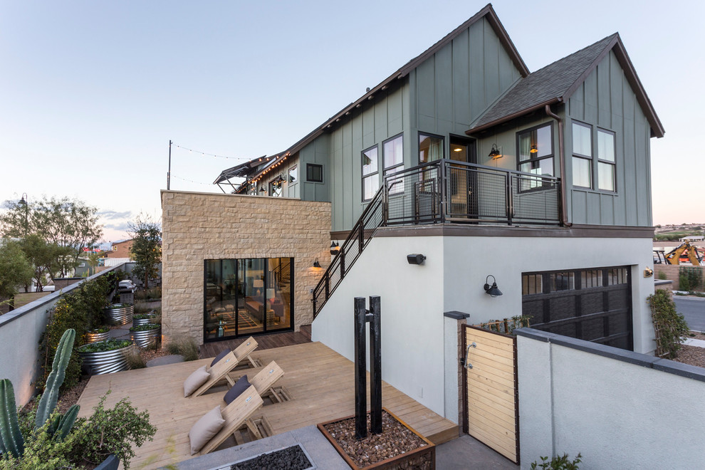 Transitional green two-story mixed siding gable roof idea in Los Angeles
