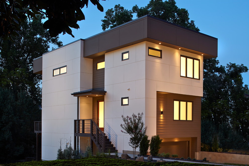 Inspiration for a large modern white three-story concrete fiberboard flat roof remodel in Atlanta