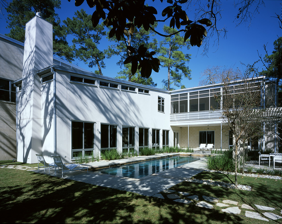 Ispirazione per la casa con tetto a falda unica grande bianco moderno a due piani con rivestimento in stucco