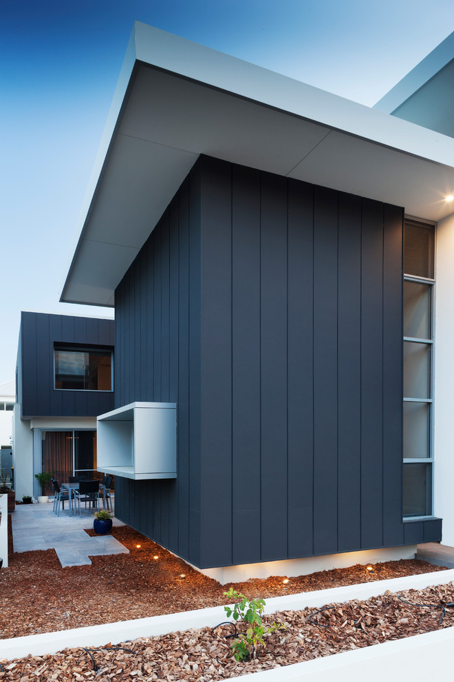 Idéer för ett modernt hus, med blandad fasad