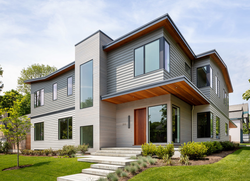 プロビデンスにあるコンテンポラリースタイルのおしゃれな家の外観 (コンクリート繊維板サイディング) の写真