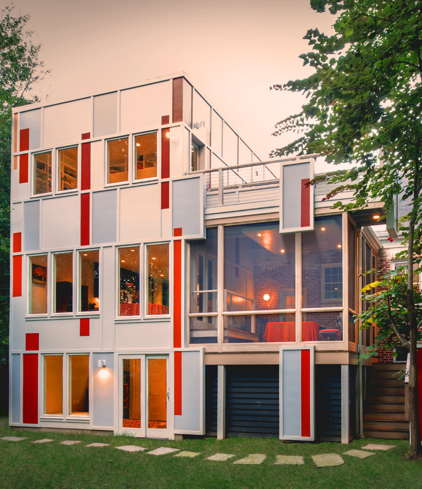 Источник вдохновения для домашнего уюта: серый, большой, трехэтажный многоквартирный дом в стиле модернизм с комбинированной облицовкой и плоской крышей