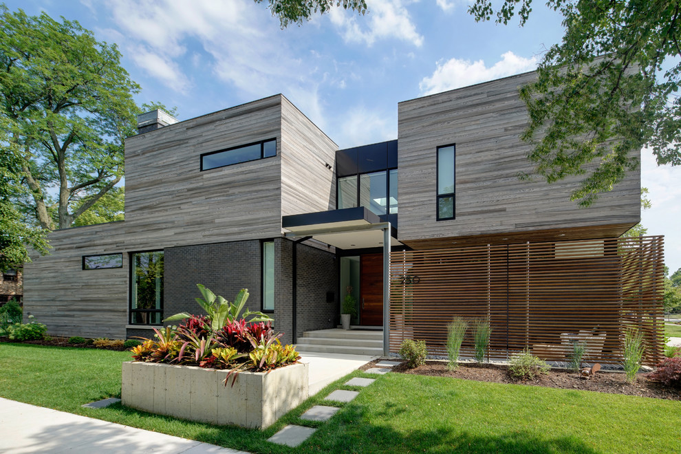 Design ideas for a gey contemporary two floor detached house in Chicago with wood cladding and a flat roof.