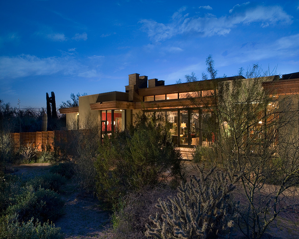 Design ideas for a rustic house exterior in Phoenix.