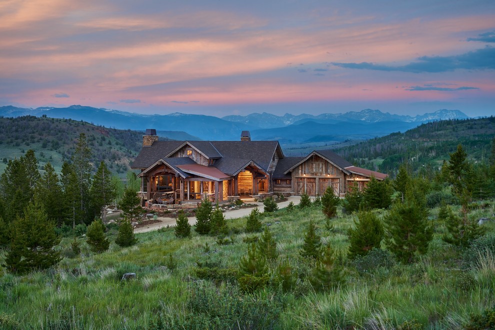 Example of a mountain style brown wood exterior home design in Denver