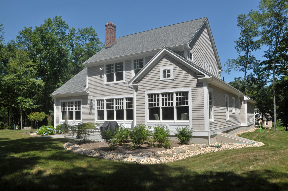 Mid-sized transitional gray two-story wood exterior home idea in New York with a shingle roof