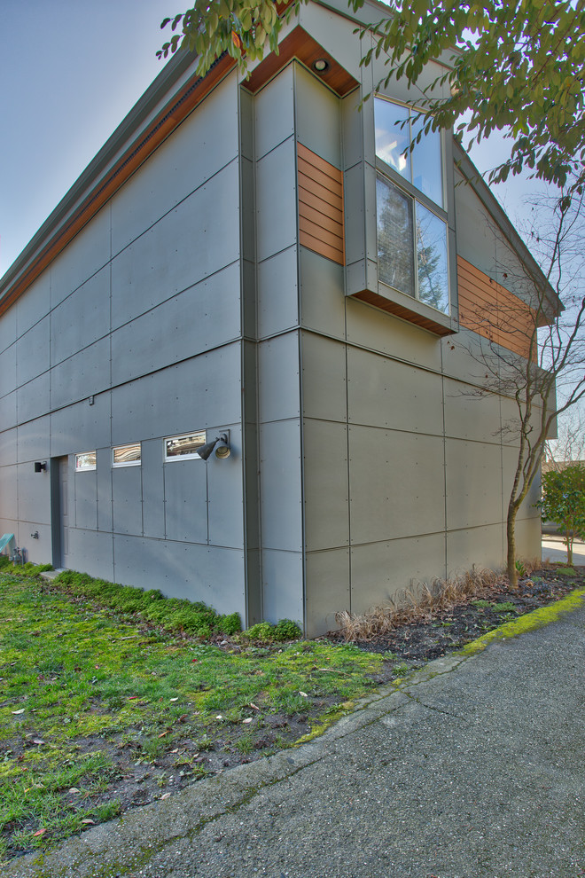 Modern siding design protects residence Modern Exterior Seattle