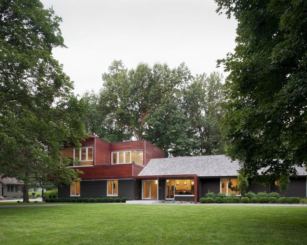 Modern house exterior in Kansas City with wood cladding.
