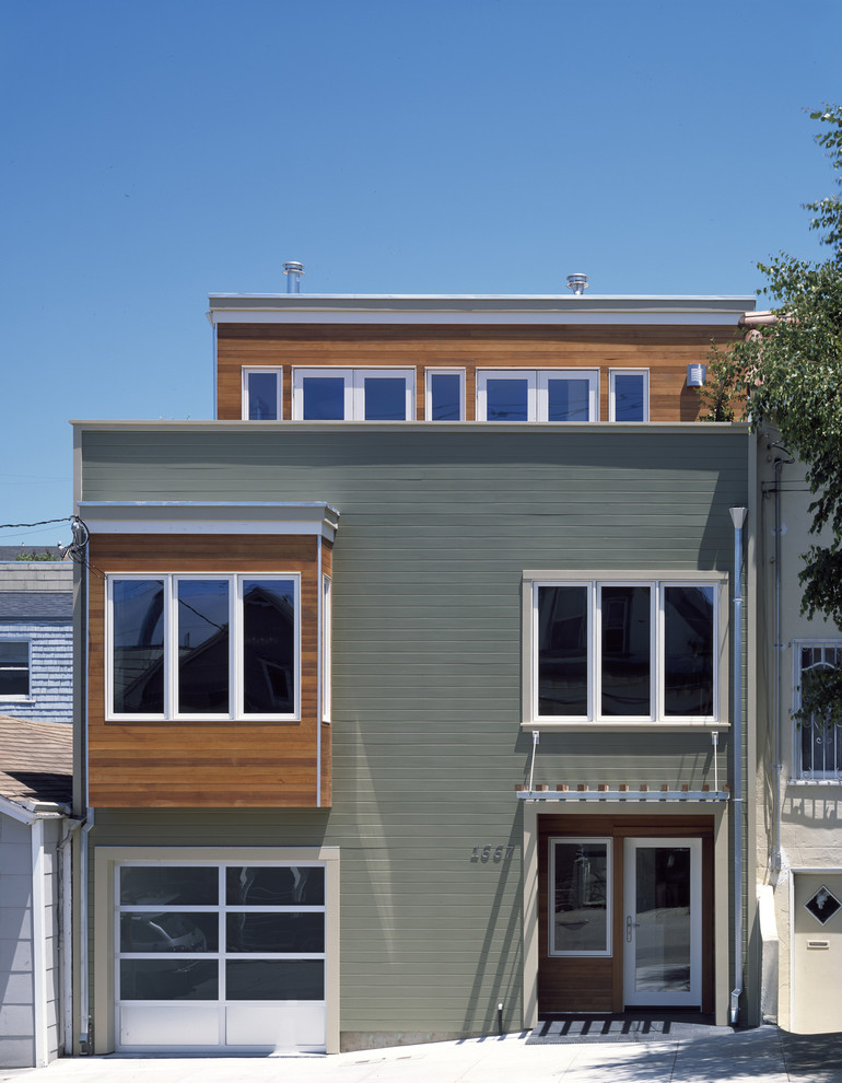 Inspiration for a contemporary wood exterior home remodel in San Francisco