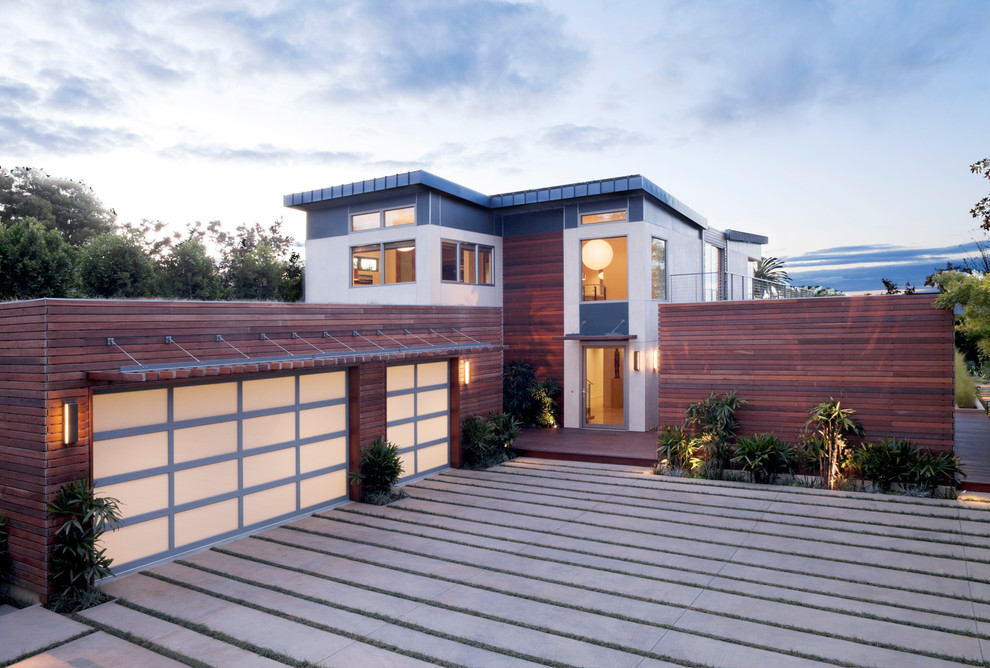This is an example of a contemporary house exterior in Santa Barbara with wood cladding.