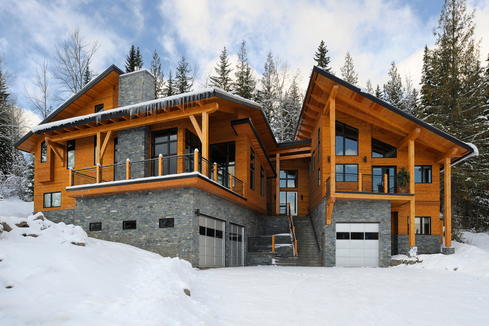 Contemporary stone exterior home idea in Vancouver