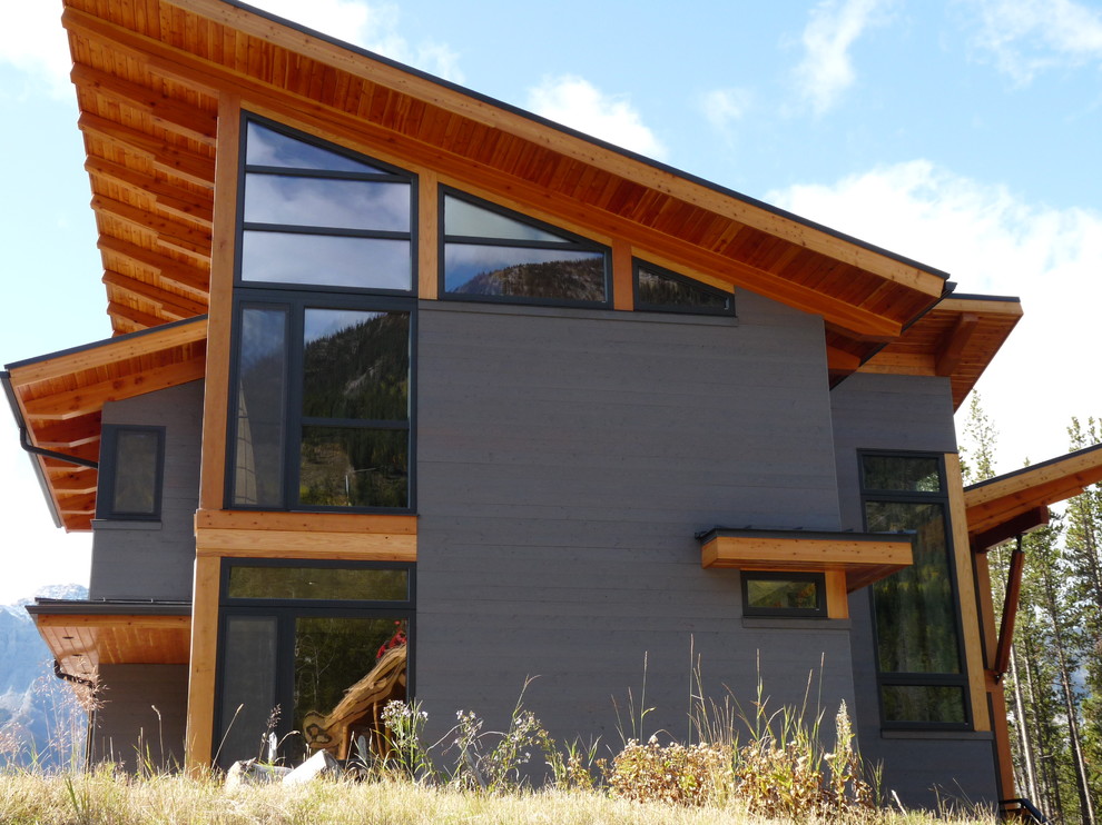 This is an example of a rustic house exterior in Vancouver with wood cladding.