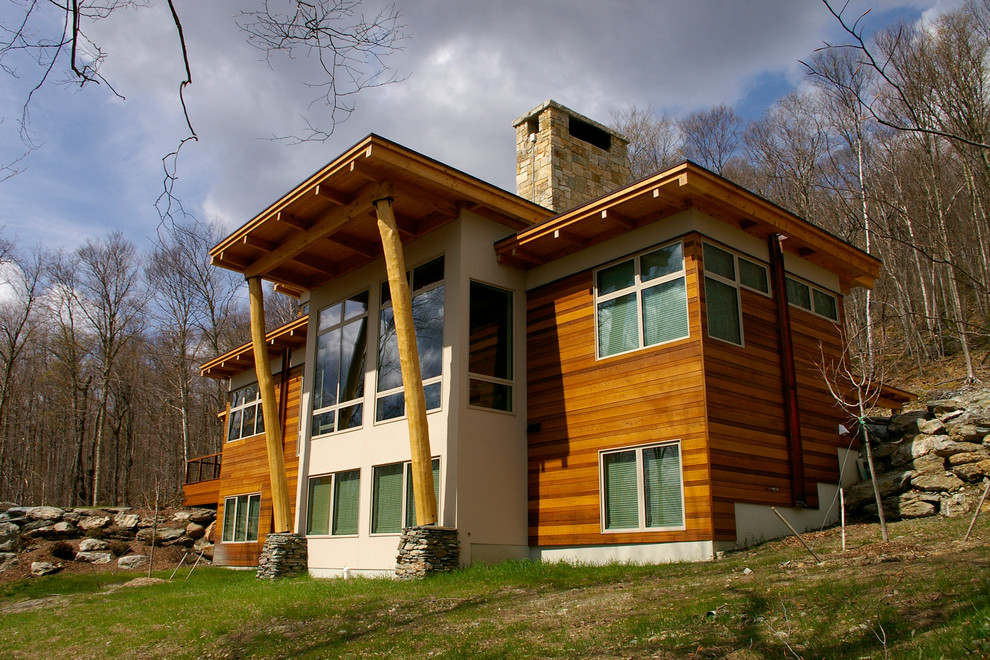 Idées déco pour une façade de maison montagne en bois.