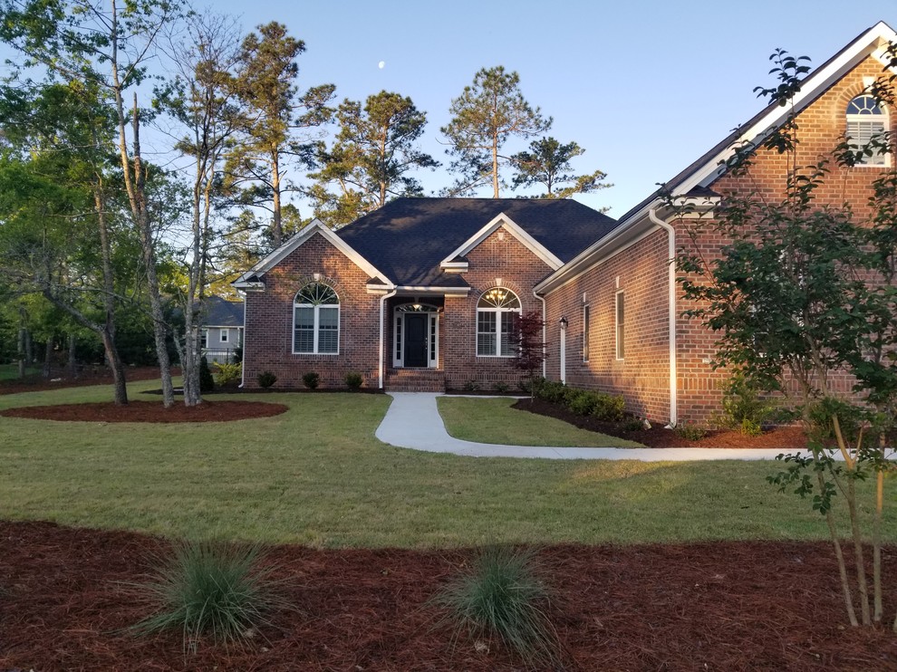 Move in day in Winding River Plantation Traditional Exterior