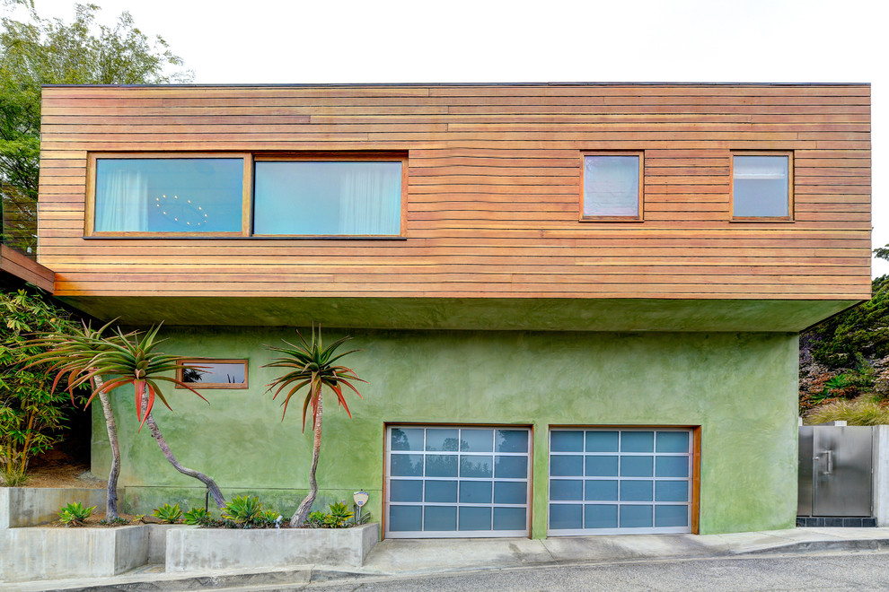 Example of a trendy two-story exterior home design in Los Angeles