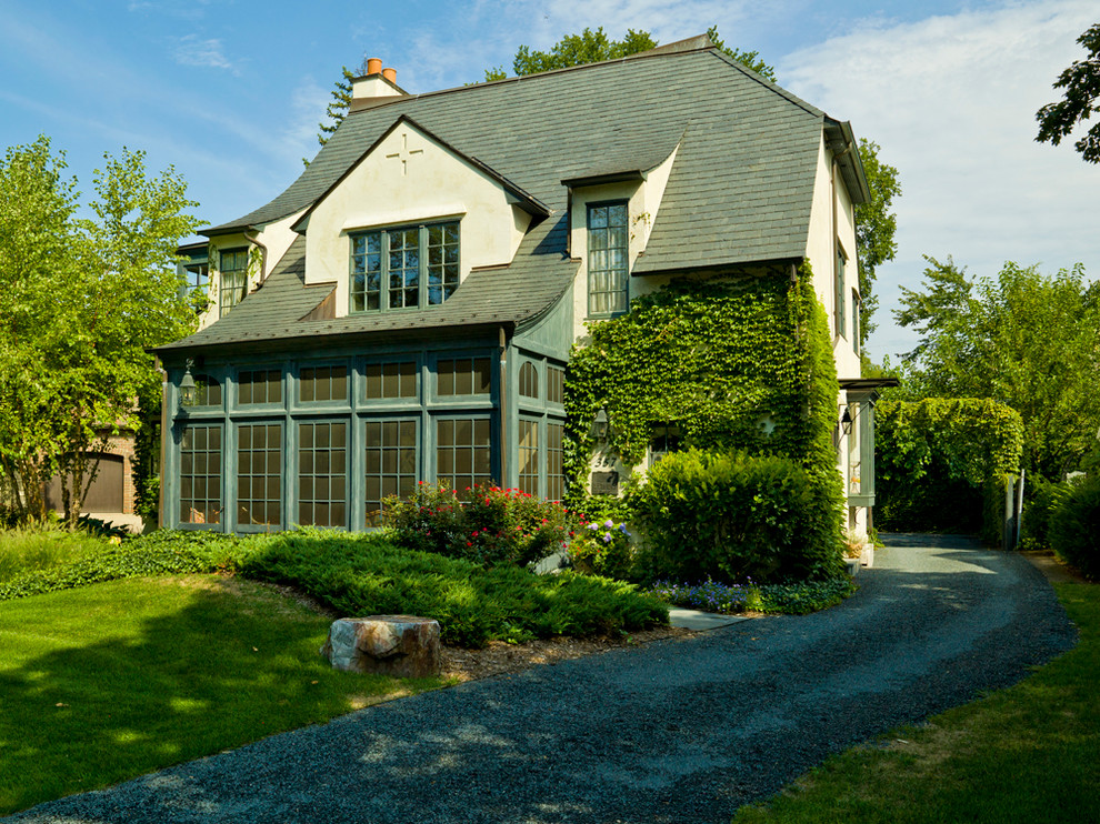 Example of a mid-sized classic two-story exterior home design in Chicago