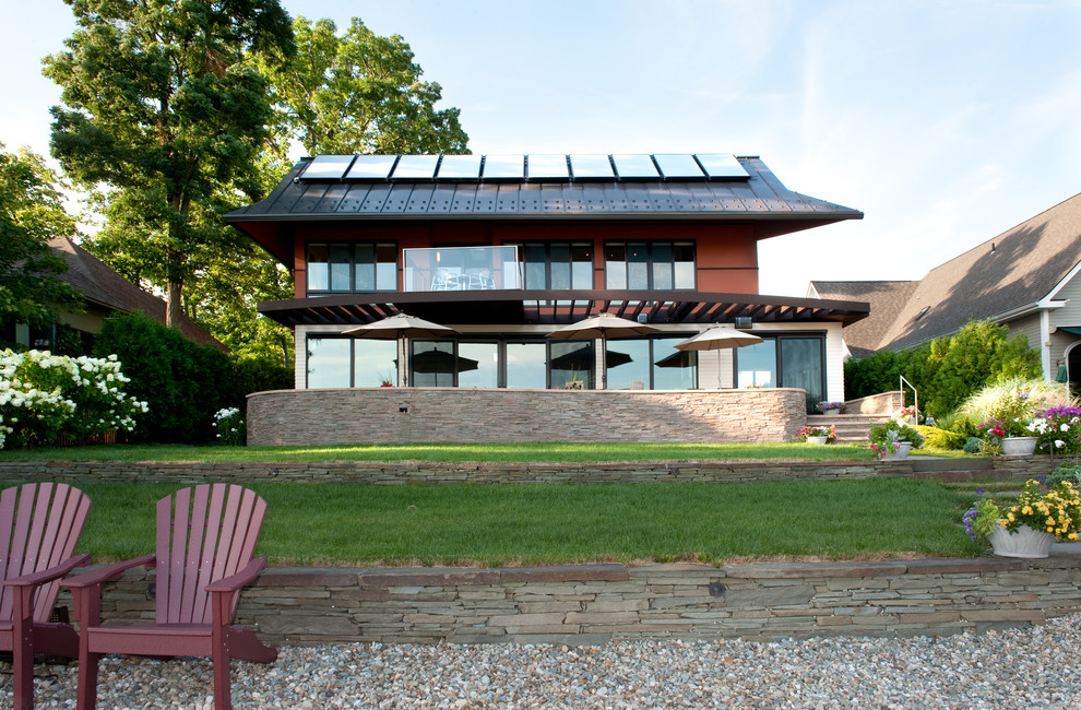 Inspiration for a contemporary two-story exterior home remodel in Boston