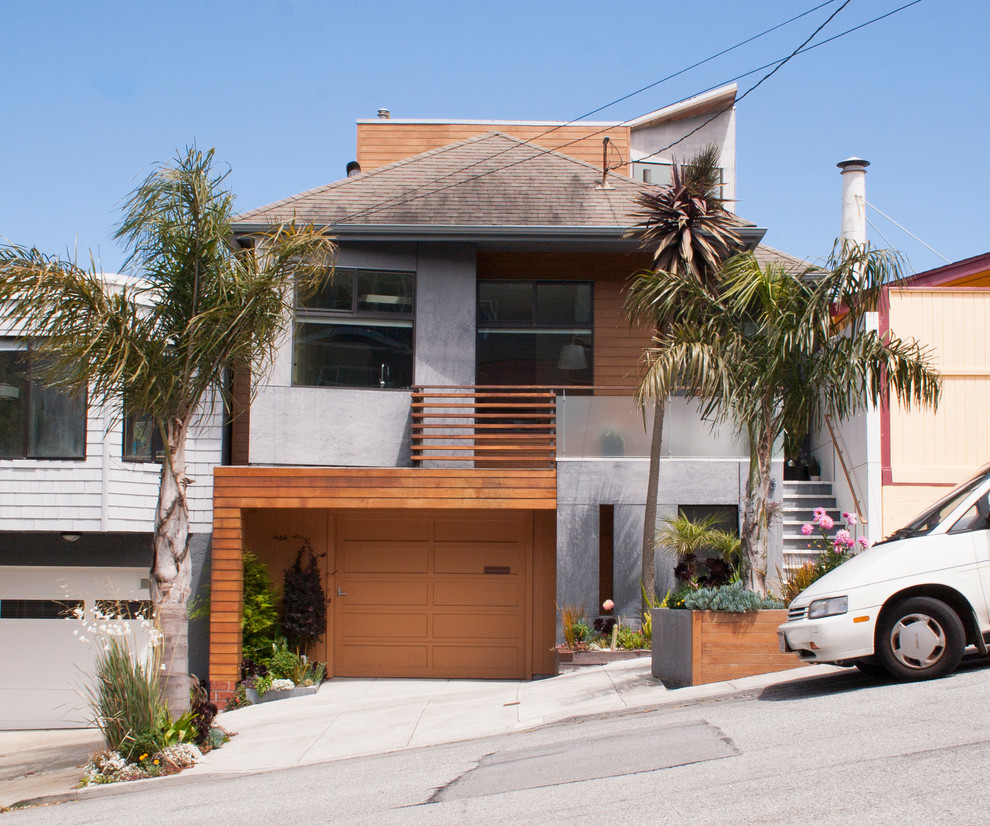 Dreistöckiges Eklektisches Reihenhaus mit Mix-Fassade, bunter Fassadenfarbe, Walmdach und Schindeldach in San Francisco