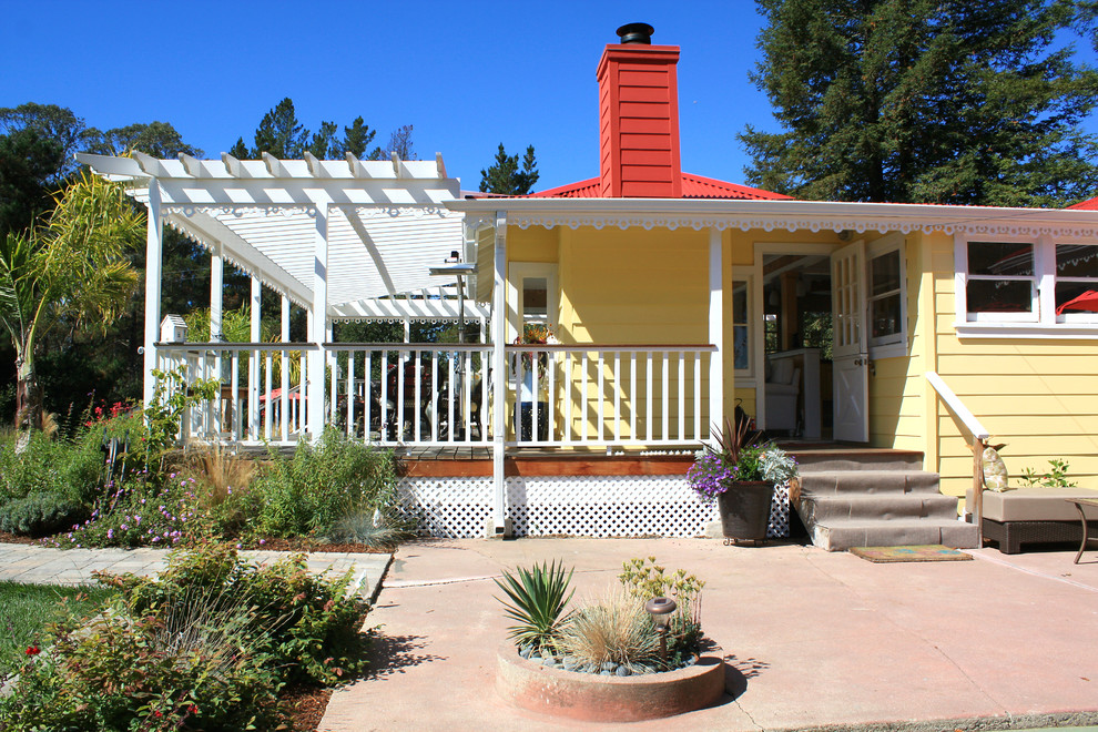 Traditional yellow exterior home idea in San Francisco
