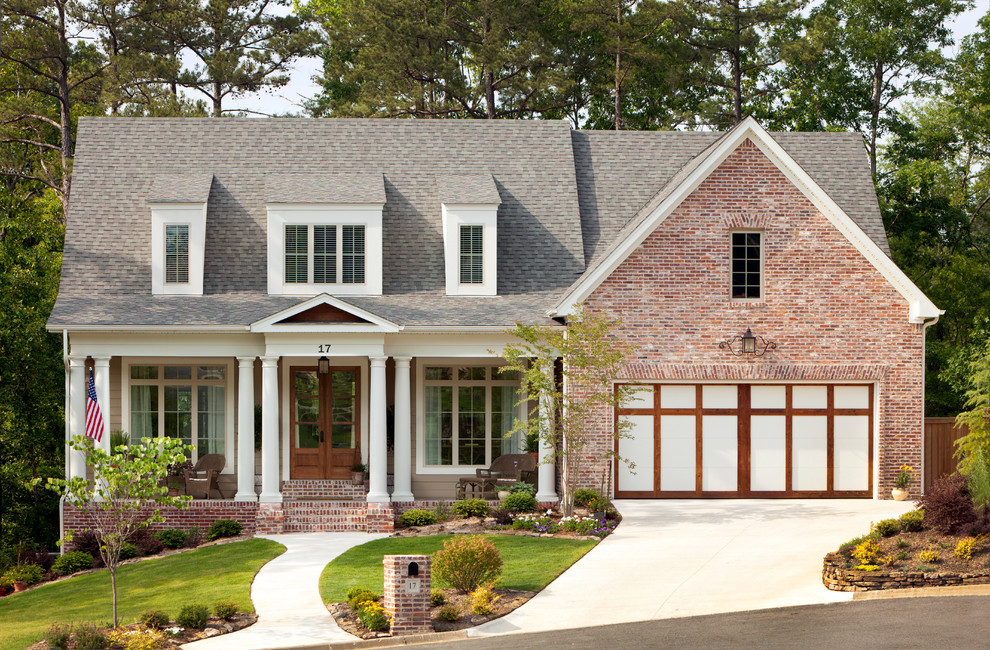 Traditional two-story brick gable roof idea in Little Rock
