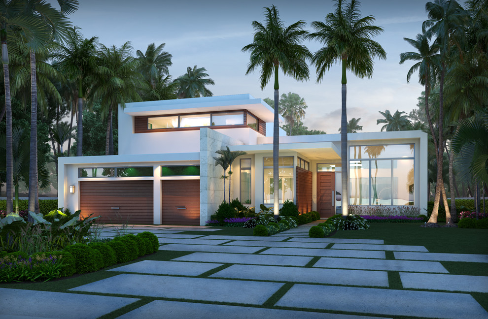 Example of a large trendy white two-story exterior home design in Miami