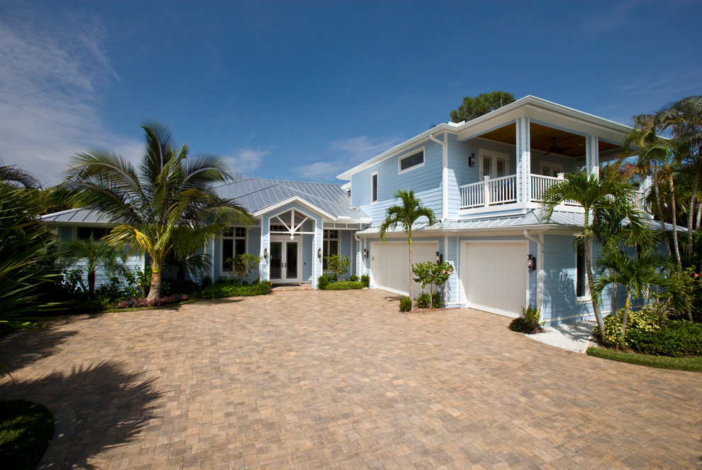 Inspiration for a beach style house exterior in Miami.
