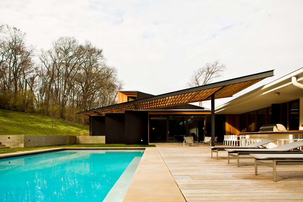 Inspiration for a large and black modern bungalow detached house in Columbus with mixed cladding and a lean-to roof.