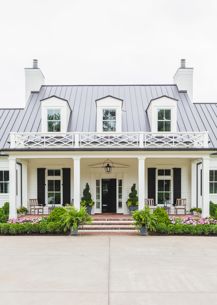Example of a classic white two-story exterior home design in Nashville