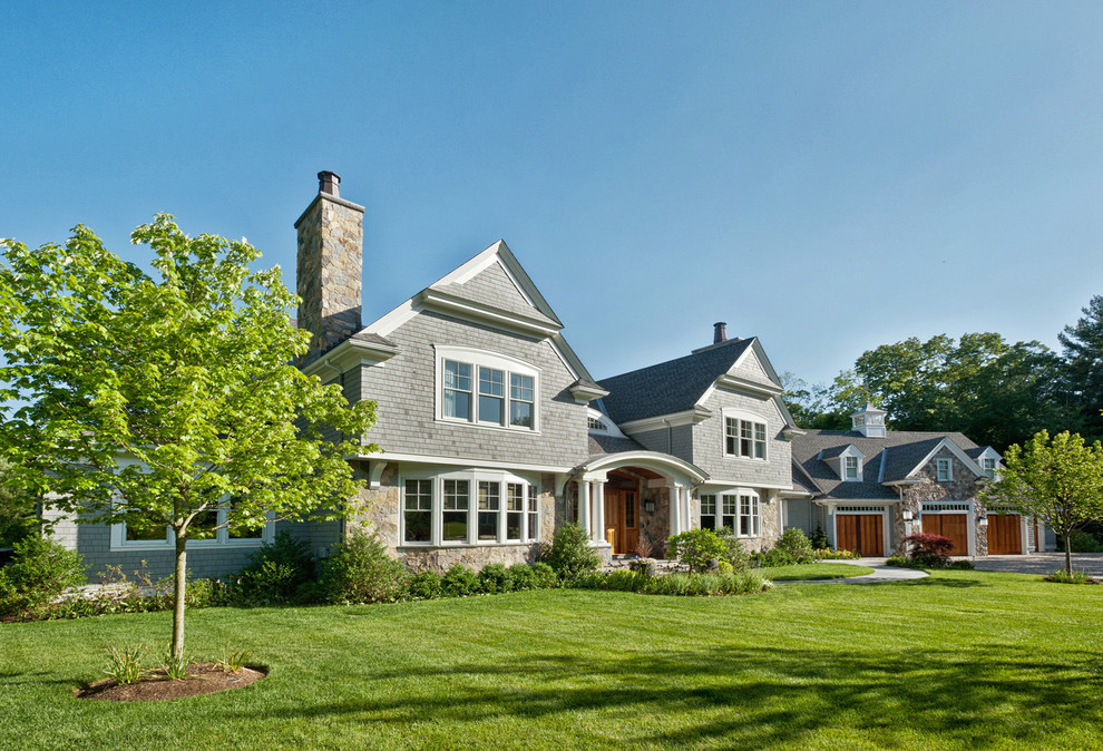 Large traditional gray two-story wood exterior home idea in Boston with a shingle roof