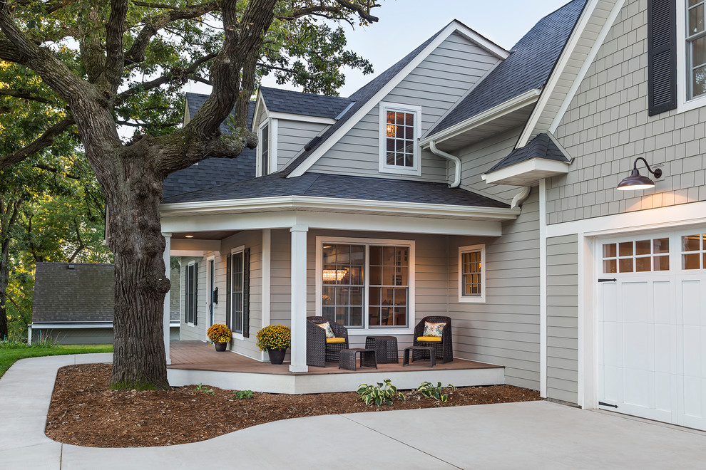 Mid-sized transitional gray two-story concrete fiberboard gable roof idea in Minneapolis