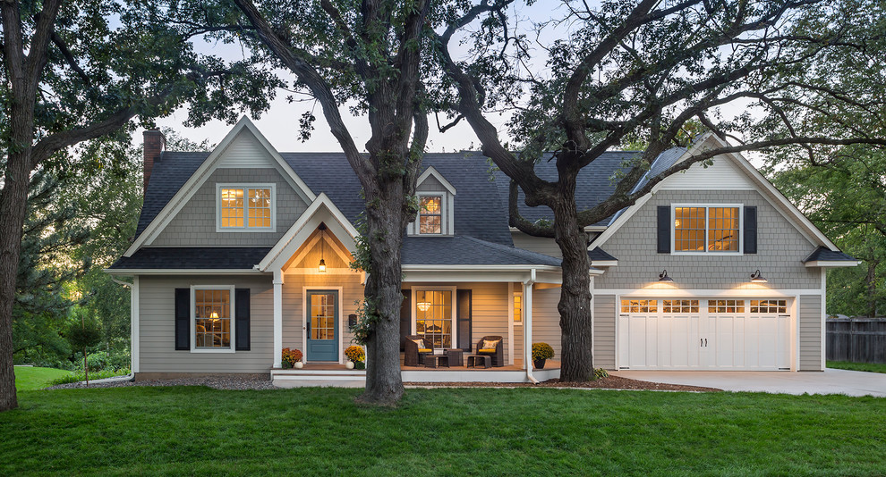 Inspiration for a mid-sized transitional gray two-story concrete fiberboard gable roof remodel in Minneapolis