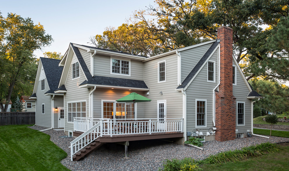 Inspiration for a transitional gray two-story concrete fiberboard gable roof remodel in Minneapolis