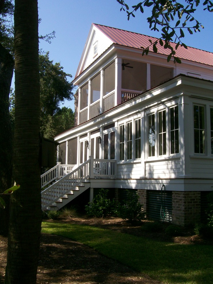 Example of an island style exterior home design in Atlanta
