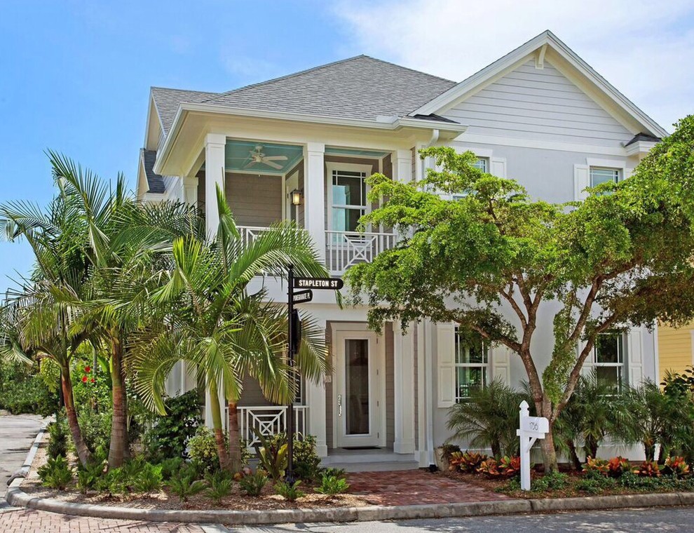 Inspiration for a coastal two-story gable roof remodel in Tampa