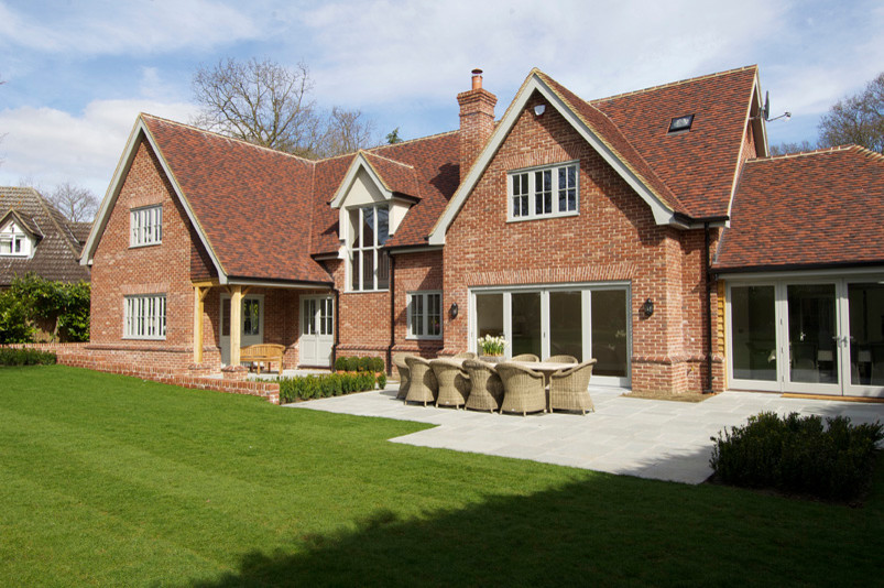 This is an example of a contemporary two floor brick house exterior in Essex.