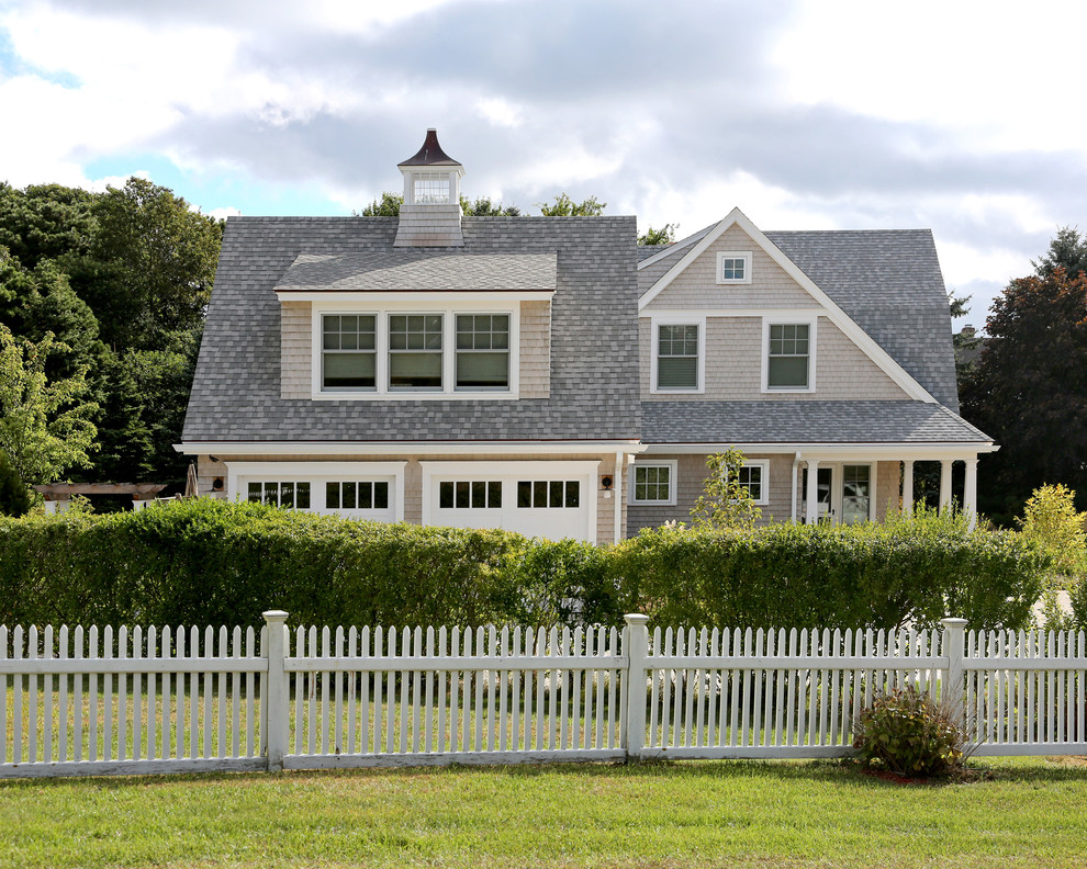 Example of a country exterior home design in Boston
