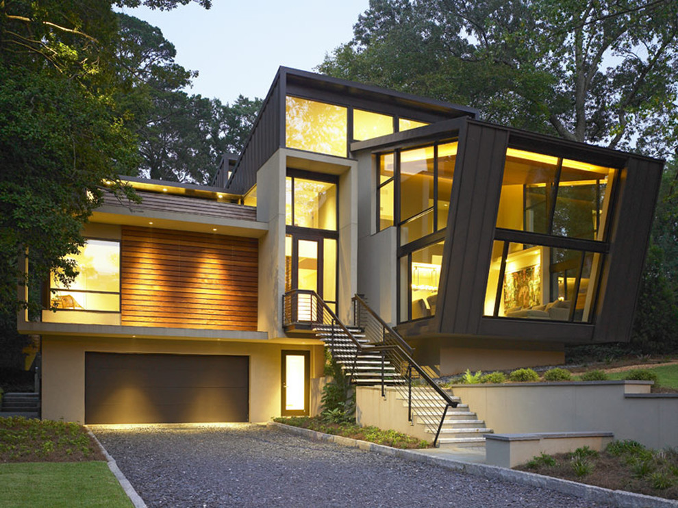 Inspiration pour une façade de maison métallique et multicolore minimaliste à deux étages et plus avec un toit plat, un toit en métal et un toit marron.