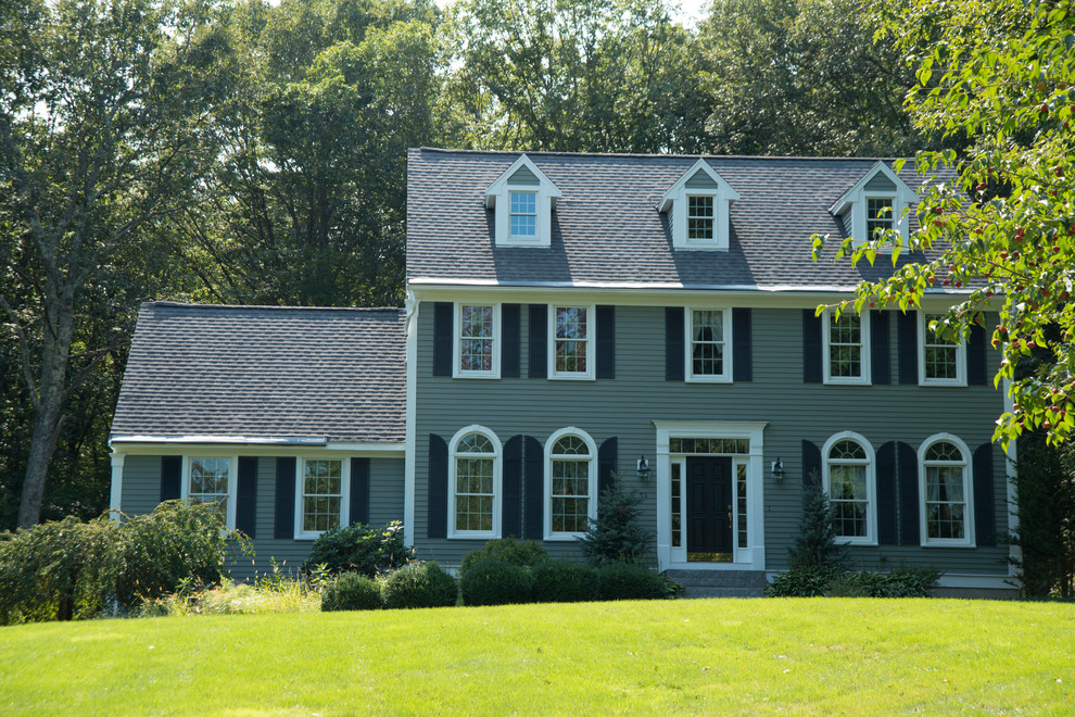 Mid-sized elegant gray two-story wood gable roof photo in Boston