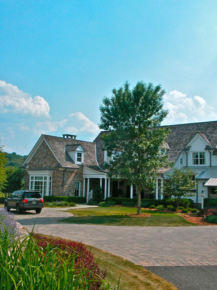 Example of a country exterior home design in New York