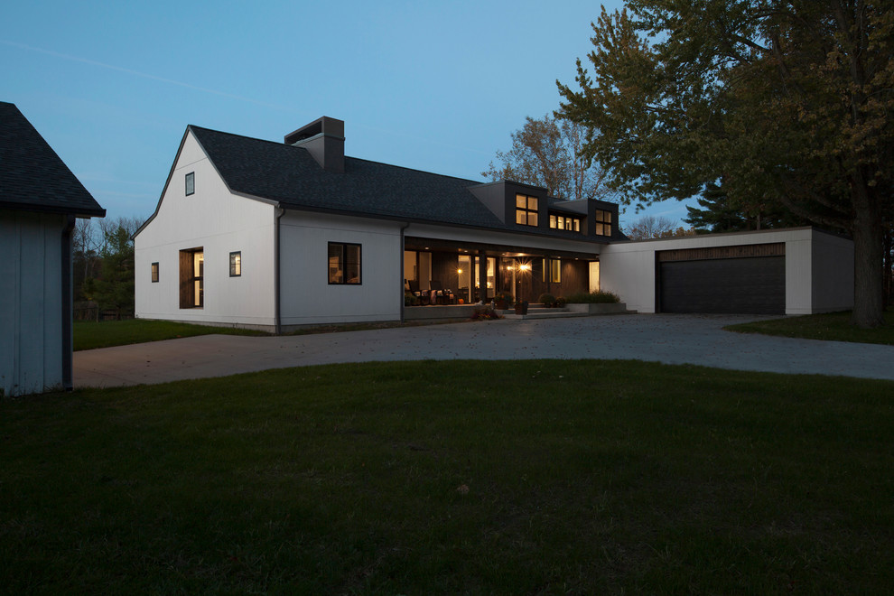 Inspiration for a medium sized and white farmhouse two floor detached house in Indianapolis with wood cladding, a pitched roof and a shingle roof.