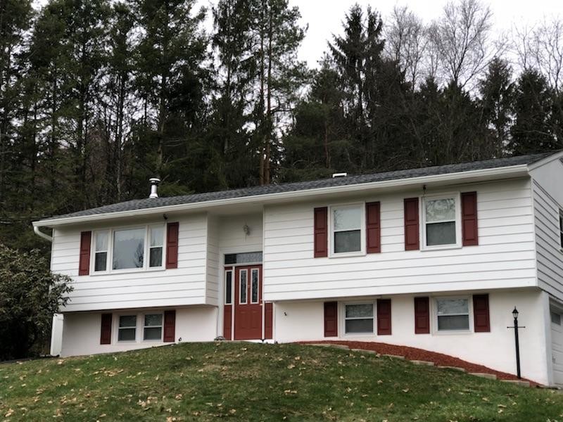 New roof on Raised Ranch Exterior New York by Luna Siding Roofing