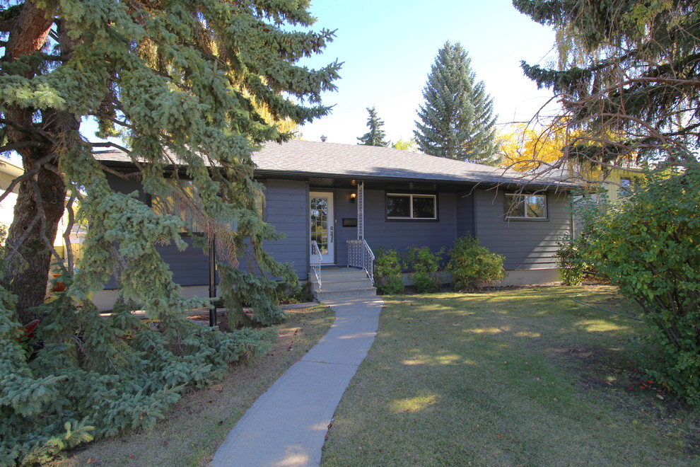 New Windows and James Hardie Siding Spruce Cliff Traditional