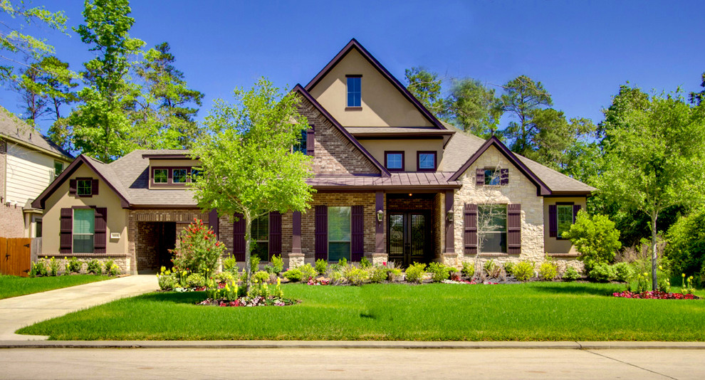 Example of an arts and crafts two-story exterior home design in Houston