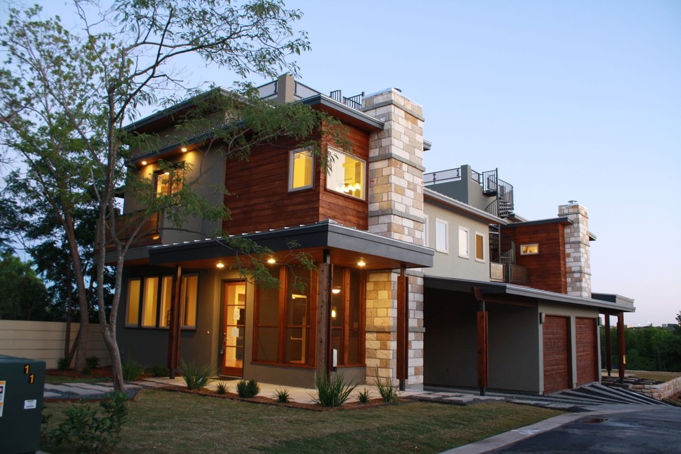 Contemporary house exterior in Austin with wood cladding.